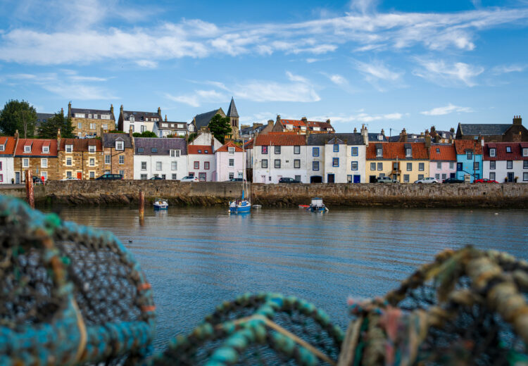 A view across from the harbour to a row of houses in St. Monans, Scotland.